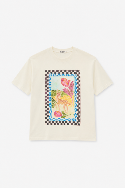 An off-white short-sleeve t-shirt with a colorful graphic print of a unicorn and flowers, framed by a checkered border, on a light gray background.